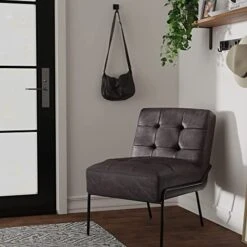 ELuxurySupply Armless Accent Chair | Upholstered Modern Living Room Chair With Metal Frame And Elegant Pintucking | Premium, Comfortable High Density Foam Cushion | Easy Assembly | Faux Black Leather