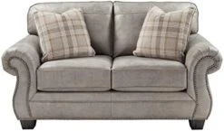 Signature Design By Ashley Olsberg Faux Leather Loveseat With Nailhead Trim And 2 Accent Pillows, Gray & Olsberg Faux Leather Ottoman With Nailhead Trim, Gray -Safavieh Furnitue Shop 41nMeTmY6L. AC